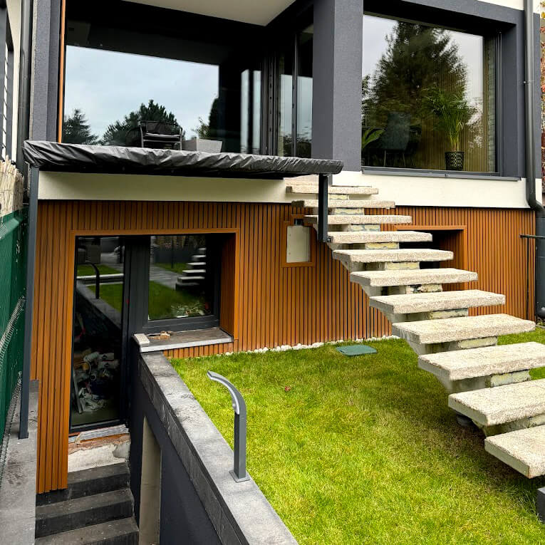 Facade with Amber 3D Louvered Composite Cladding – Modern Elegance