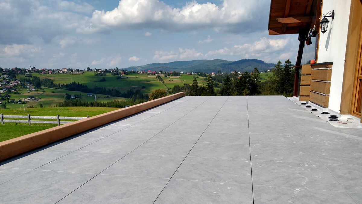 Terracce made of Stoneware tiles Sierra Gray