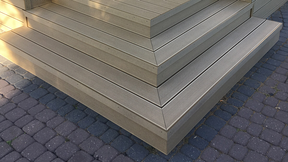 Stairs and high terrace made of WPC decking boards standard Honey Teak