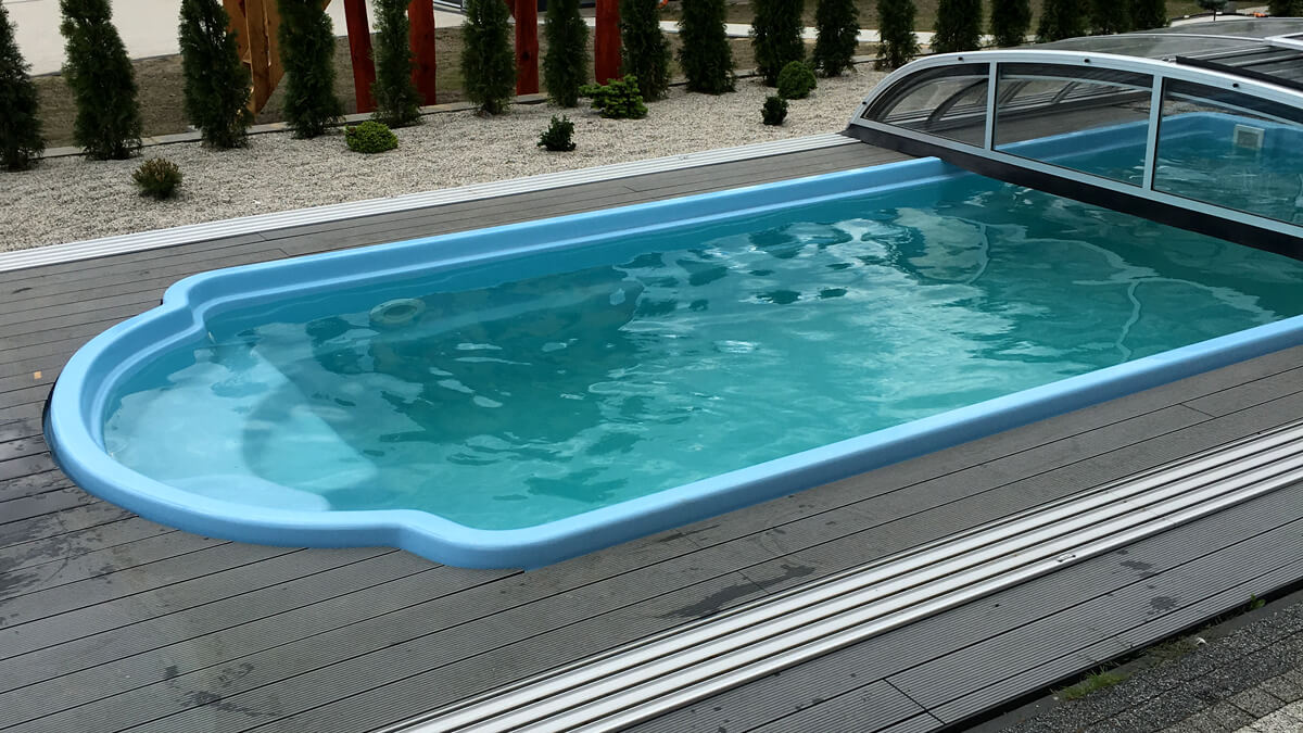 Pool enclosure made of composite decking boards Standard Light Gray