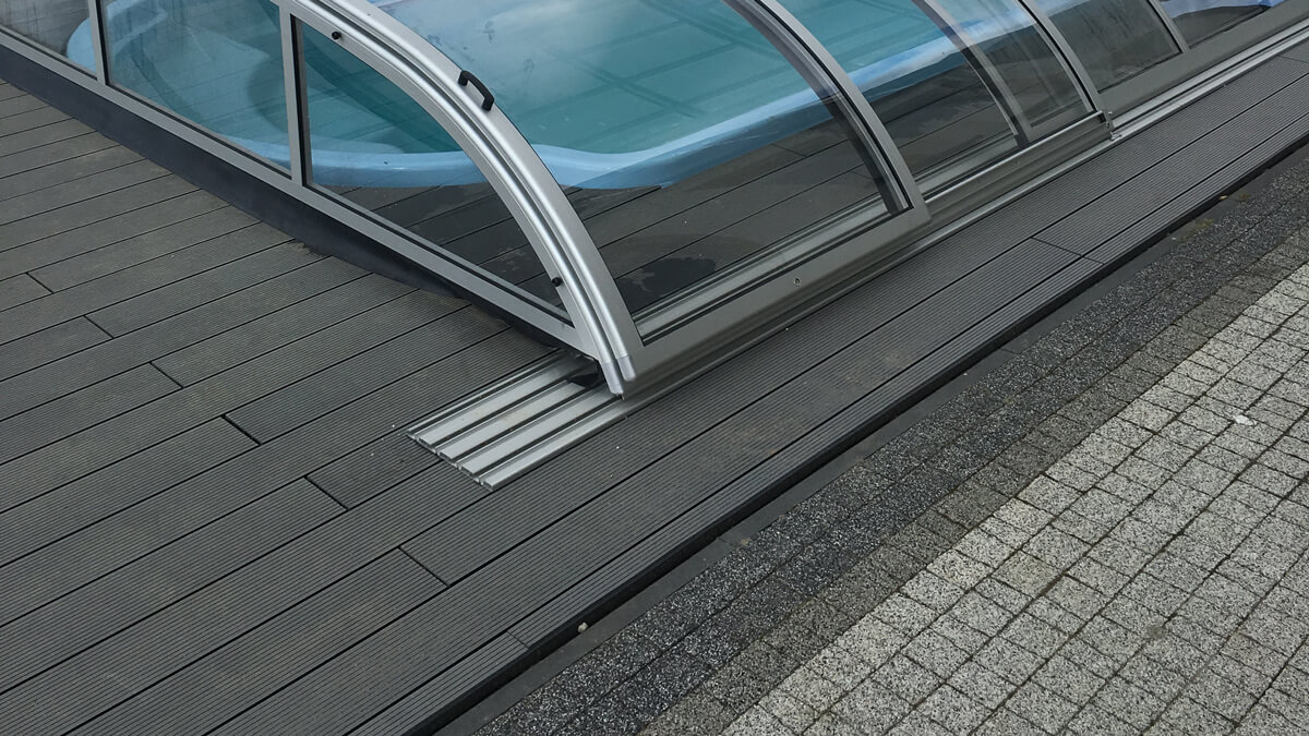 Pool enclosure made of composite decking boards Standard Light Gray