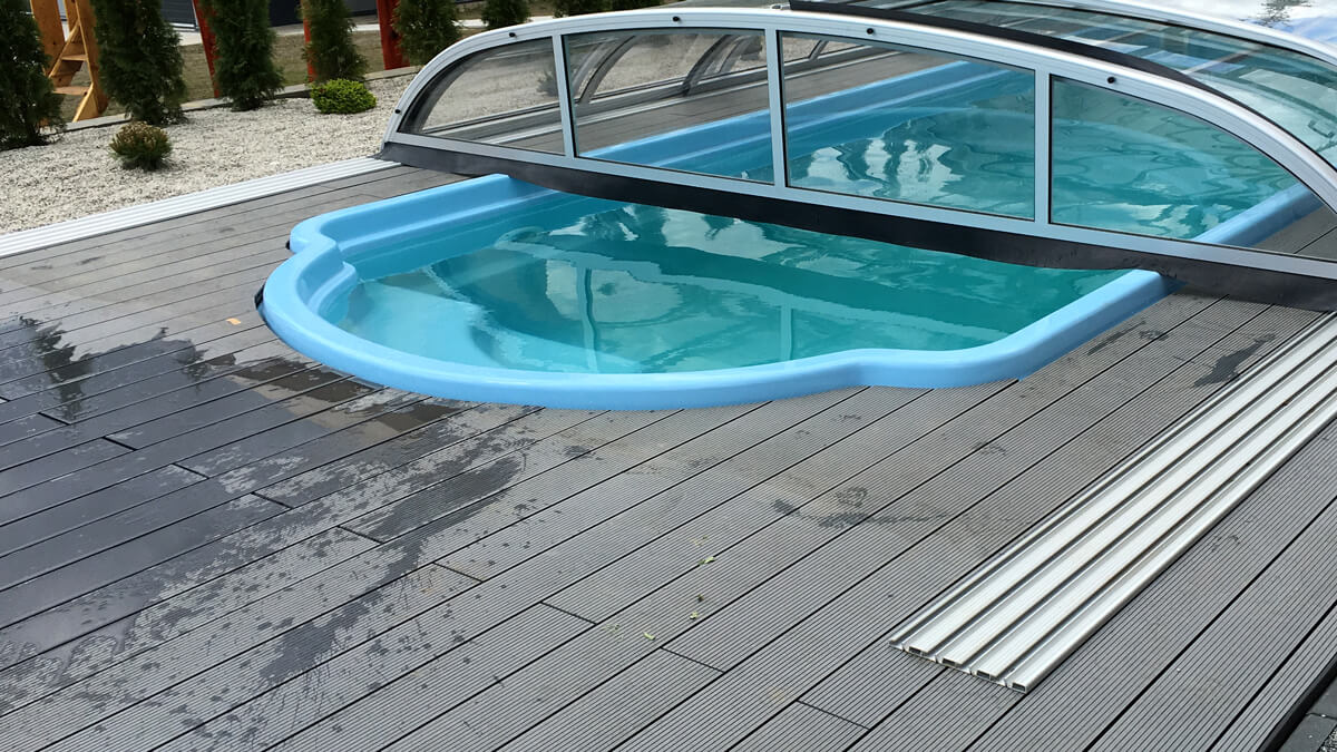 Pool enclosure made of composite decking boards Standard Light Gray