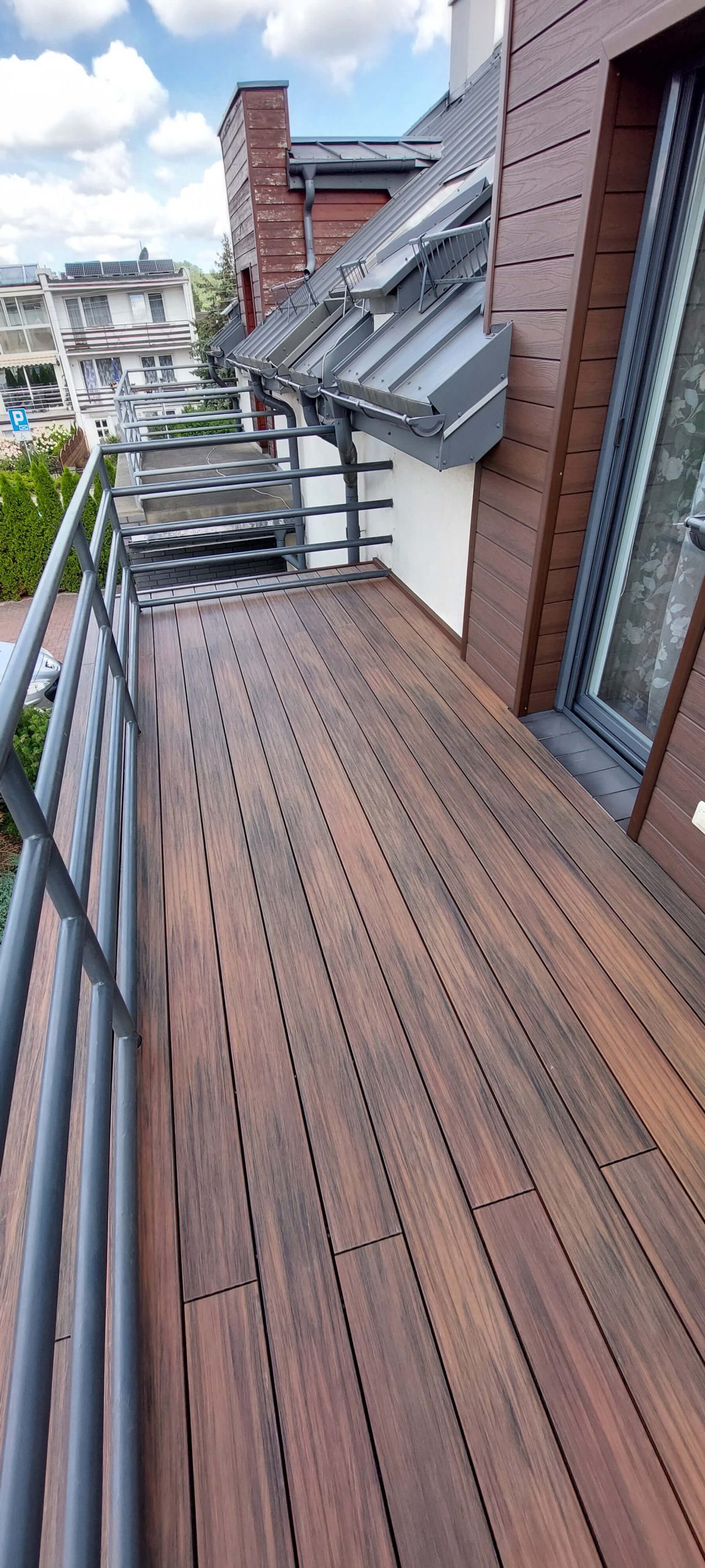 Balcony made of composite decking board Premium Redwood
