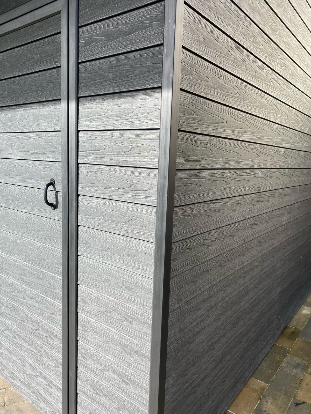 Garden house with a canopy made of Premium Gray composite boards