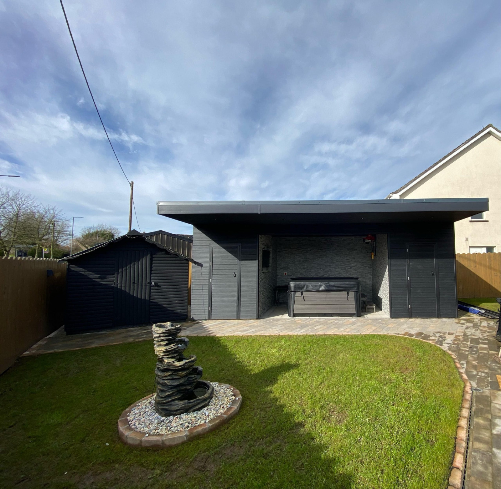Garden house with a canopy made of Premium Gray composite boards