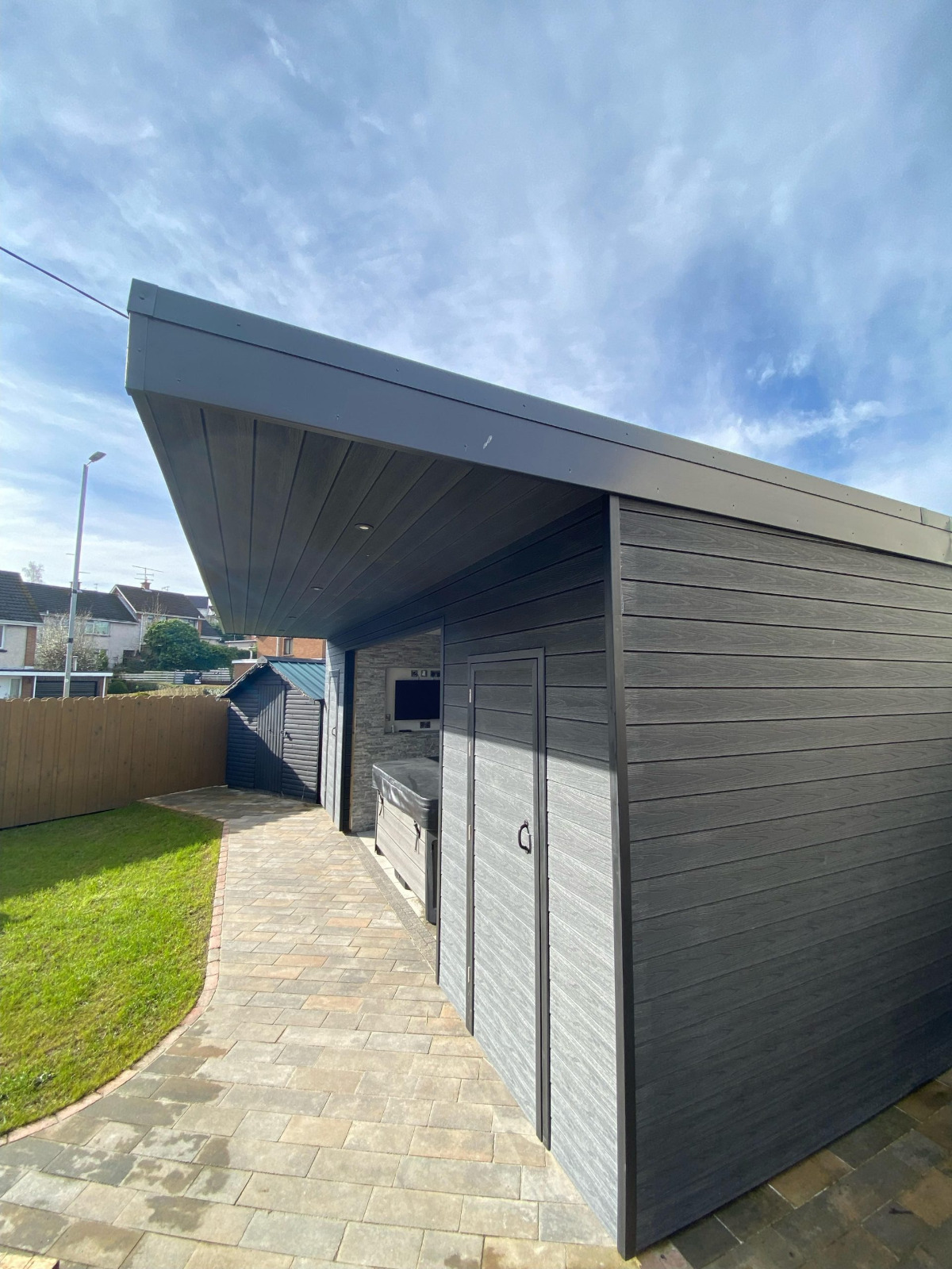 Garden house with a canopy made of Premium Gray composite boards