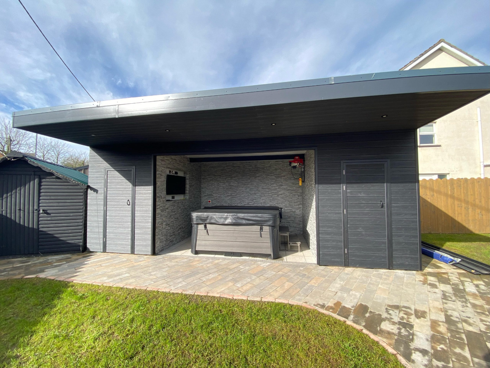 Garden house with a canopy made of Premium Gray composite boards