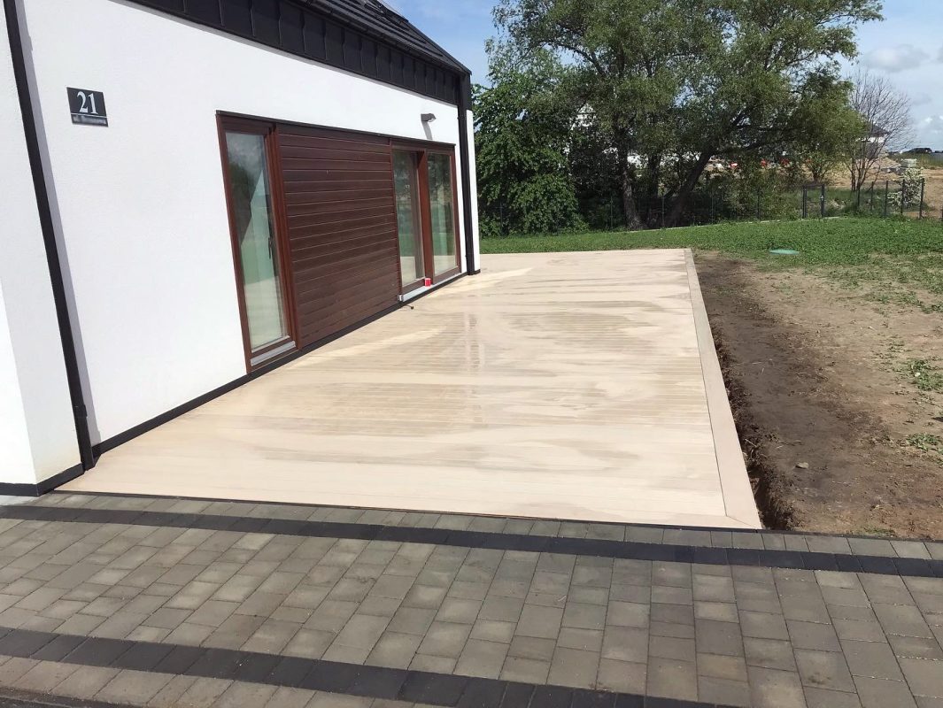 Large Terrace Made of Ecru Premium Composite Decking Boards