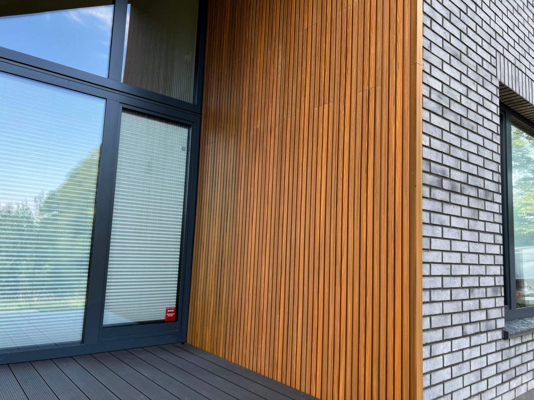 Amber 3D composite slats on building facade