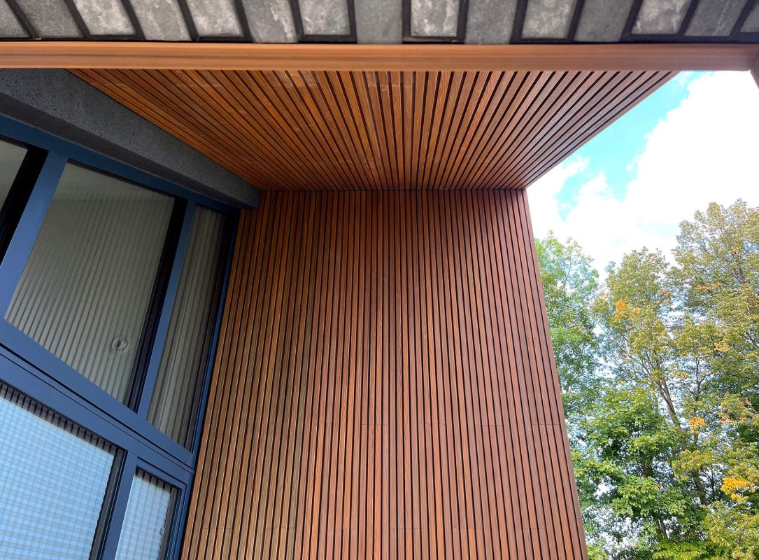 Amber 3D composite slats on building facade