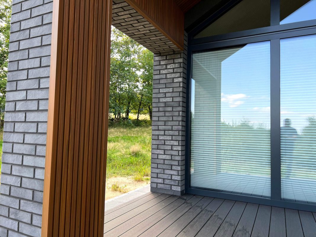 Amber 3D composite slats on building facade