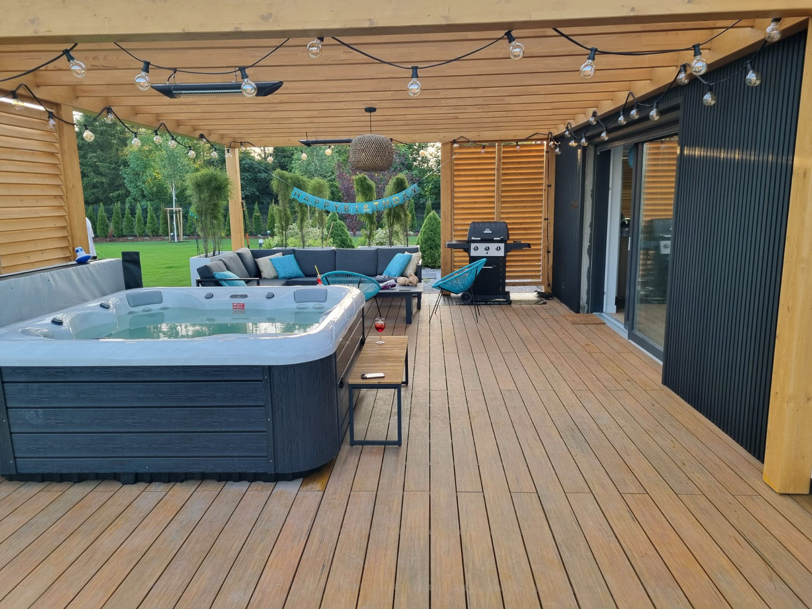 Luxury terrace made of Premium Amber composite decking with a pool