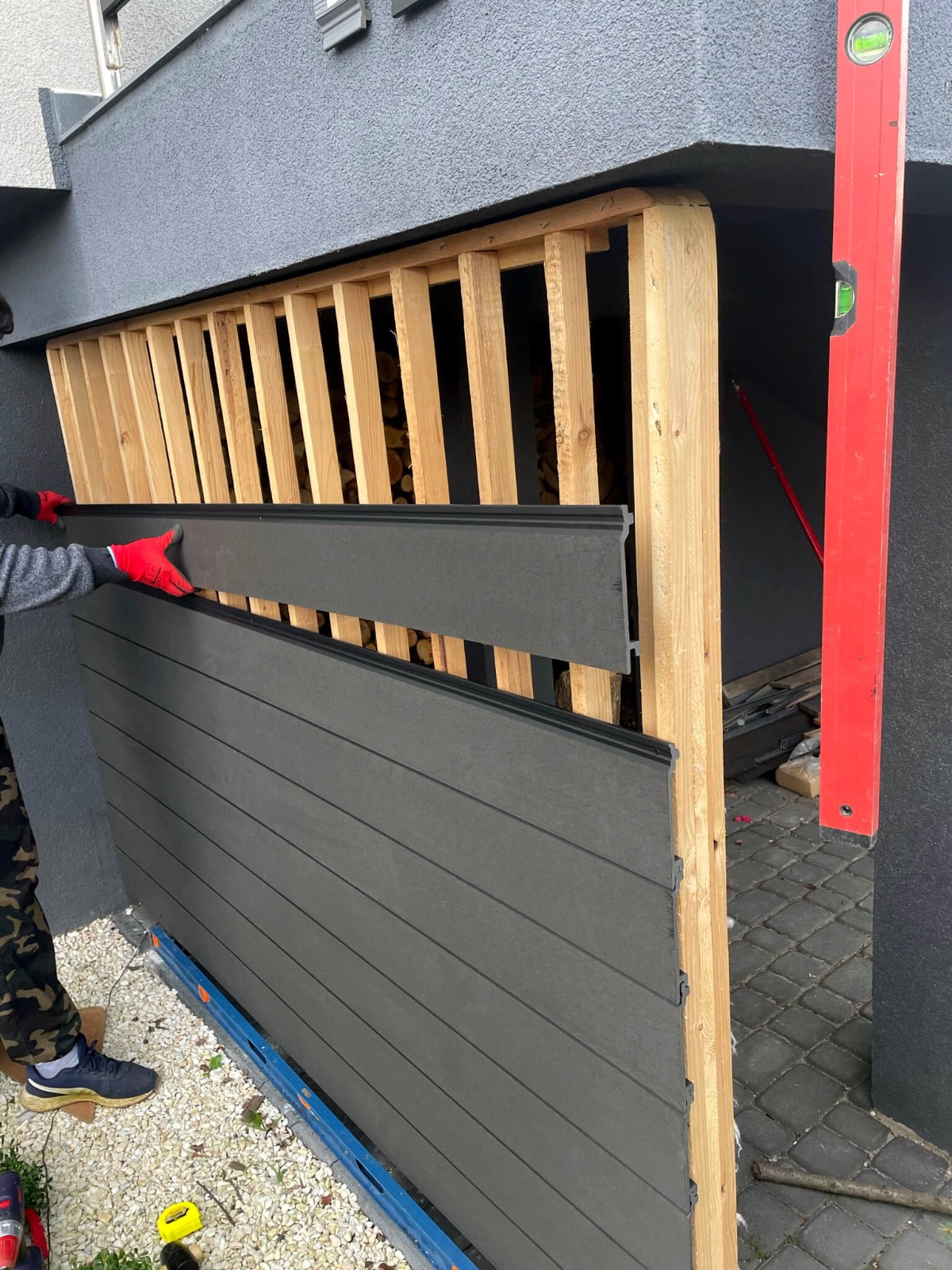 Installation of Standard Anthracite composite decking facade