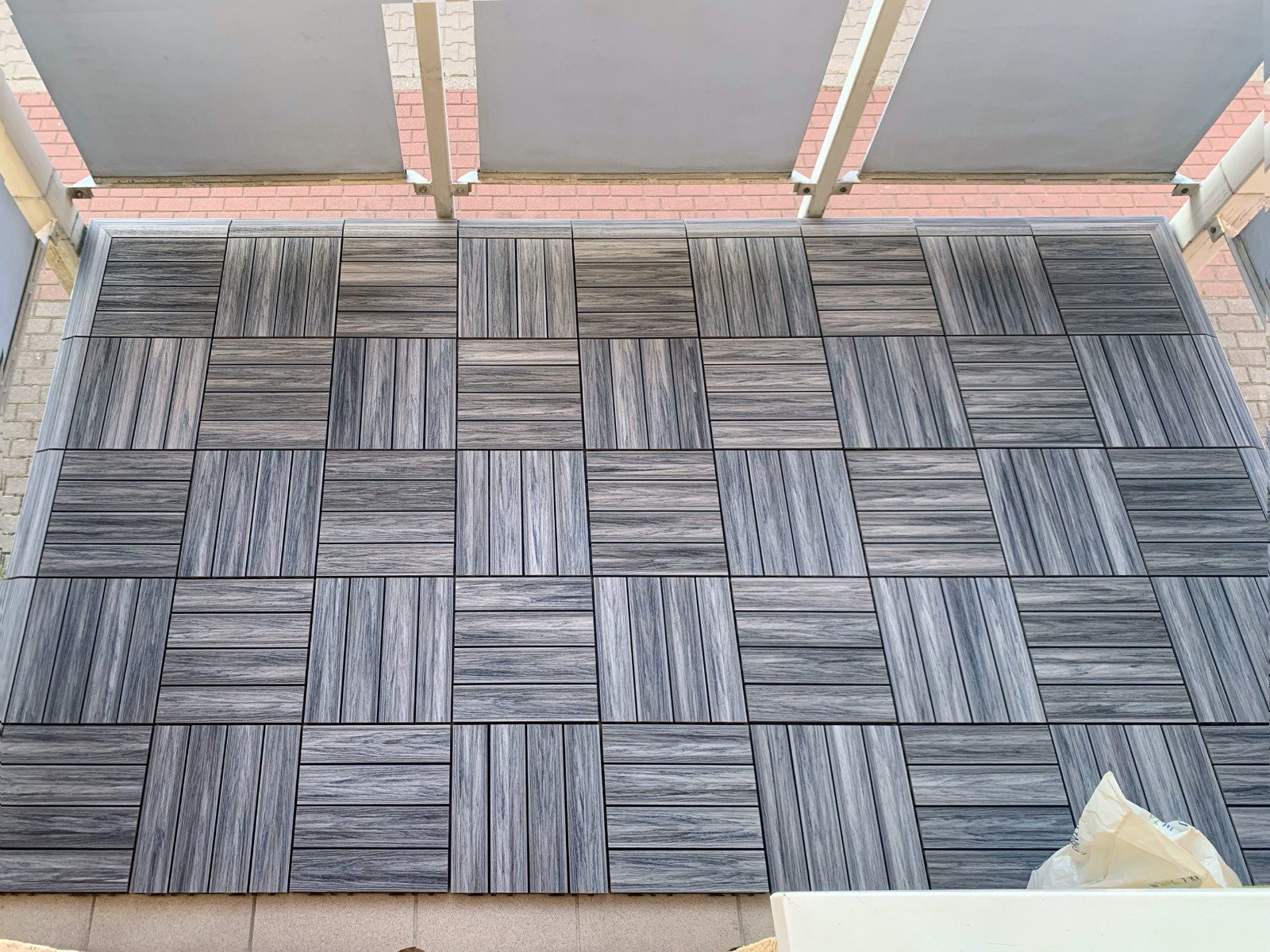 Balcony made of composite decking tiles Premium Gray