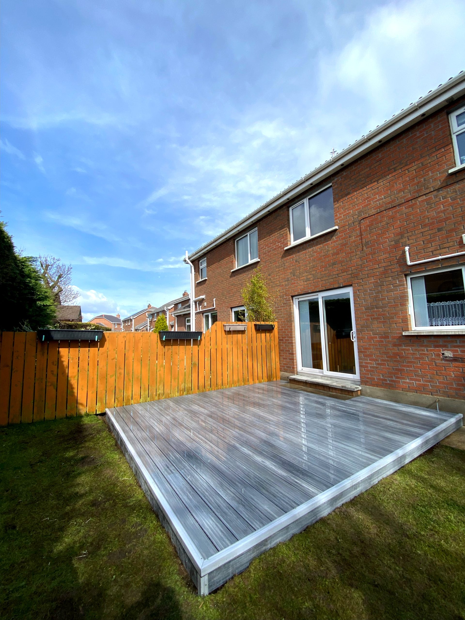 Premium Gray composite decking terrace – a stylish accent in a home garden