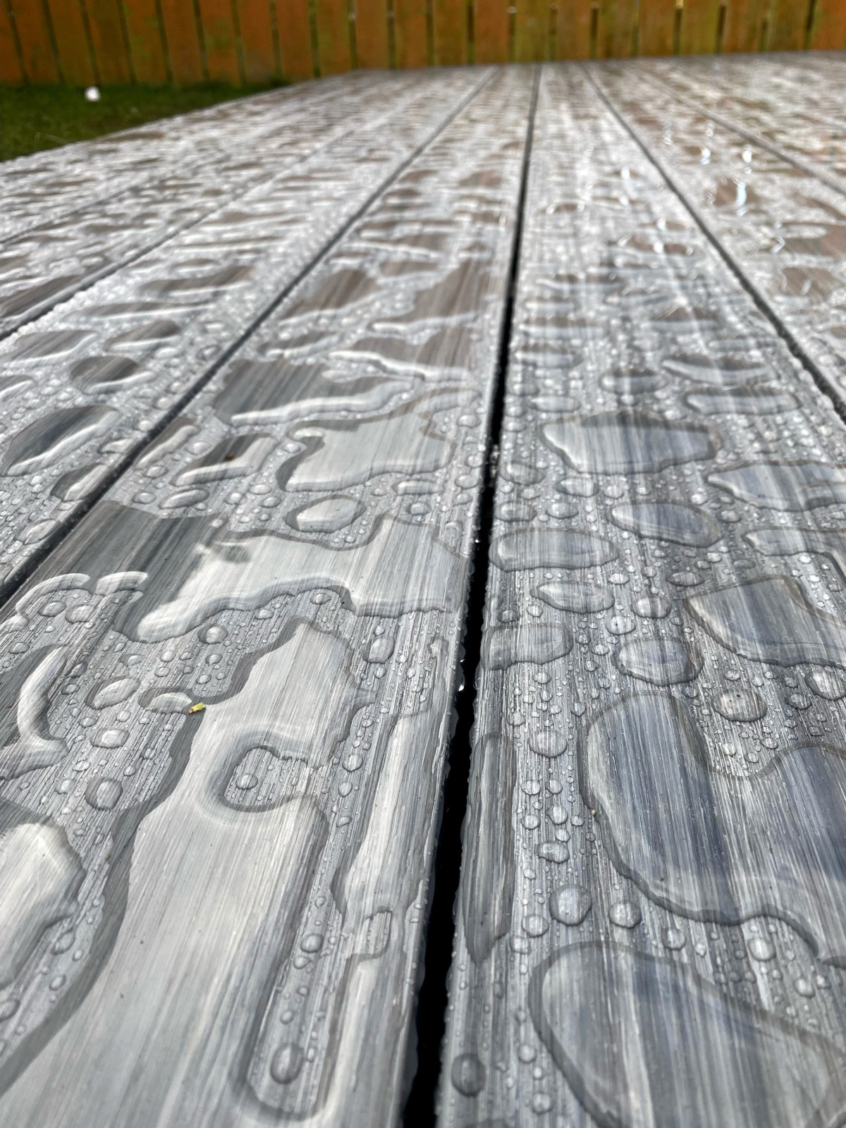 Premium Gray composite decking terrace – a stylish accent in a home garden