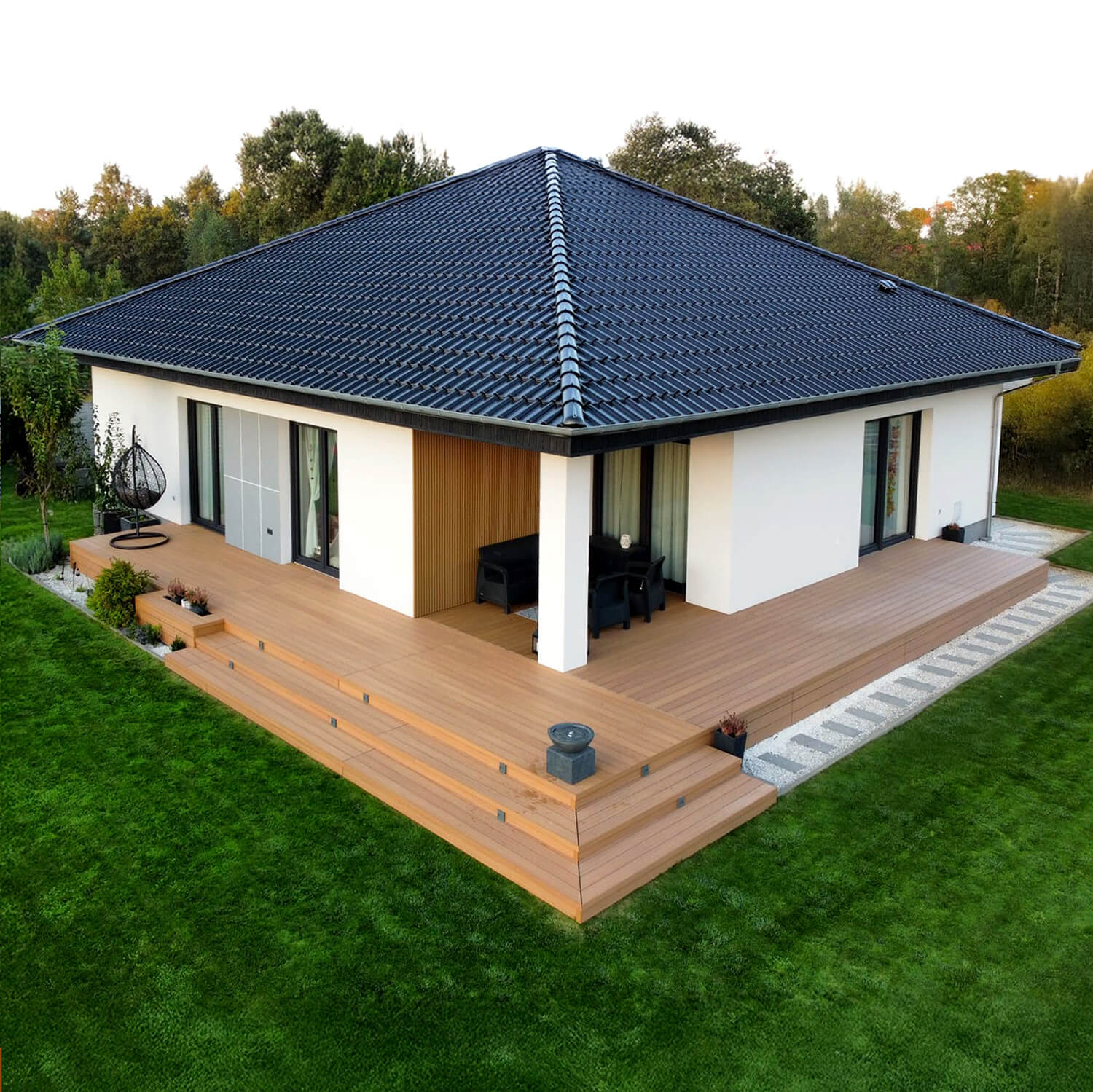 Terrace and facade arrangement in Oak shades – Premium Natural Oak decking boards with Premium Oak slats