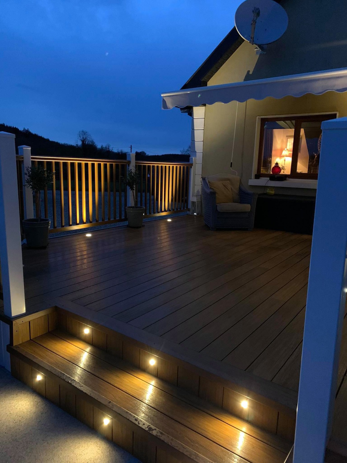 Terrace with stairs - composite decking boards Premium Amber