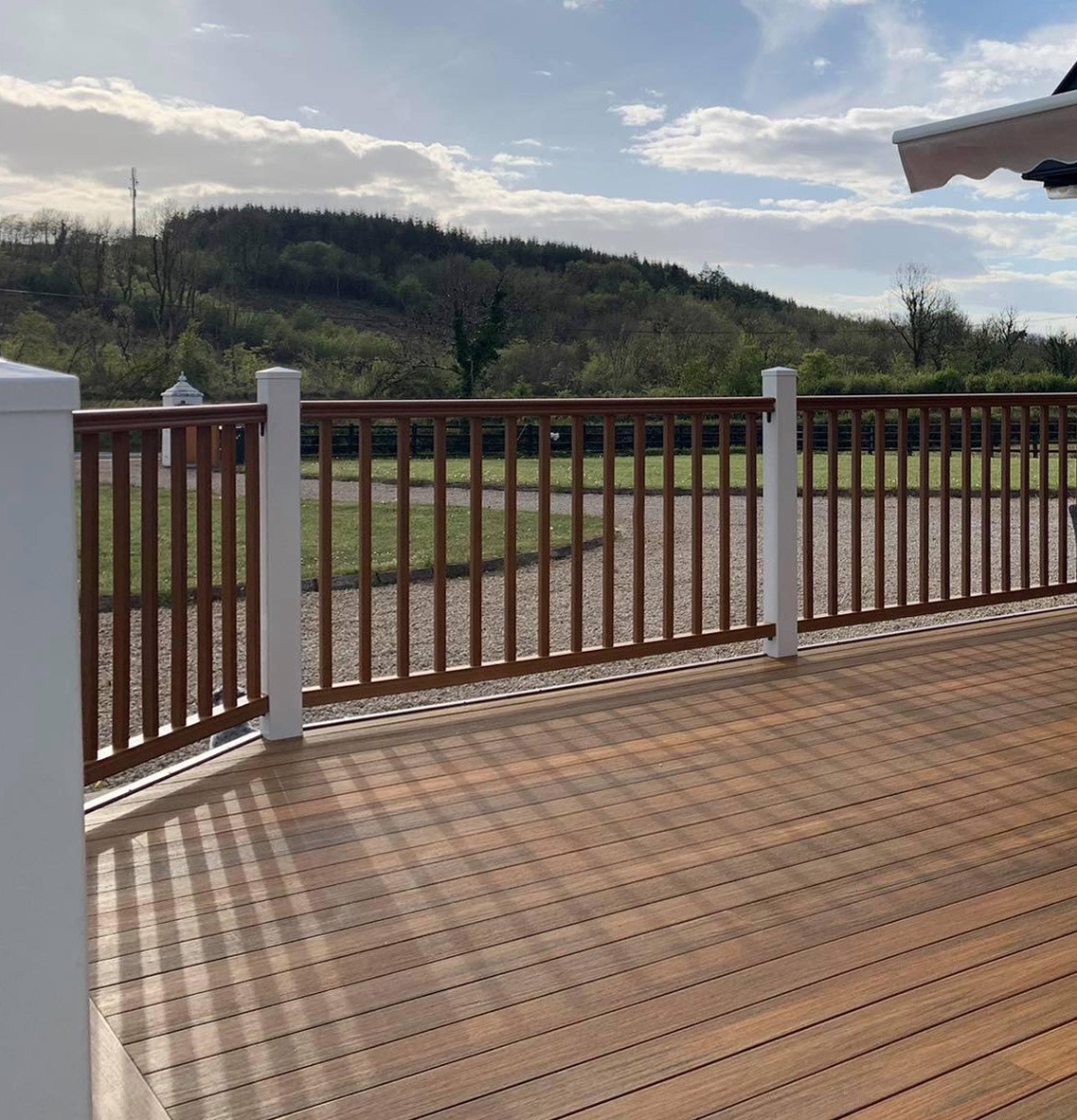 Terrace with stairs - composite decking boards Premium Amber