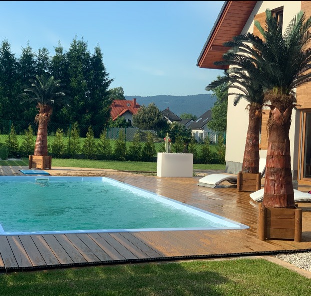 Swimming pool cladding and decking made of WPC decking boards Premium Amber